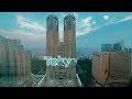Sunrise reflecting off the Tokyo Metropolitan Government Building - Timelapse