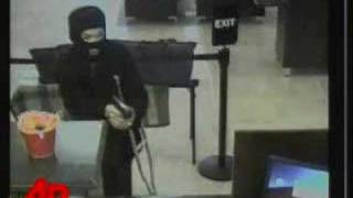 Raw Video: Bank Robber on Crutches