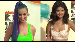 Selena gomez and katy perry rocked sexy crop tops at the 2012 kcas -
but who wore it best? check out them backstage on stage accepting
their awards l...