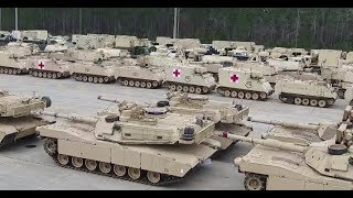 Aerial view of U.S. Army BRIGADE armor and support vehicles