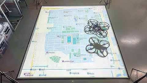 Indoor Localization for Quadrotors using Invisible Projected Tags