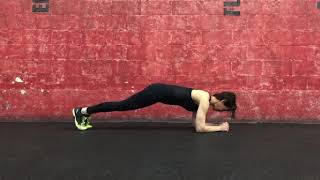 Elbow plank alternating knee across