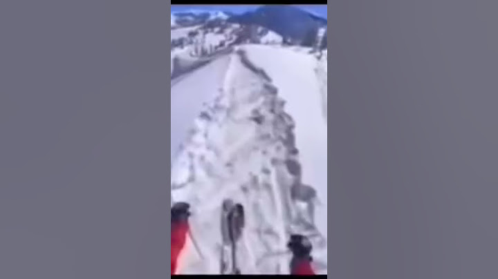 man falls off a cliff while skiing 😨 (he survived dw)