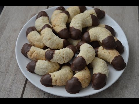 Video: Hoe Maak Je Met Donkere Chocolade Bedekte Kokos- En Notensnoepjes