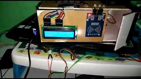 SISTEM  MEMBUKA  PINTU MENGGUNAKAN  PASSWORD ,TOUCH SENSOR  DAN  SIMULASI  PINTU OTOMATIS , MENJALAN