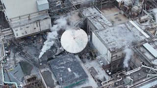 At least 11 dead after crews find bodies in debris after chemical tank explosion in Washington state