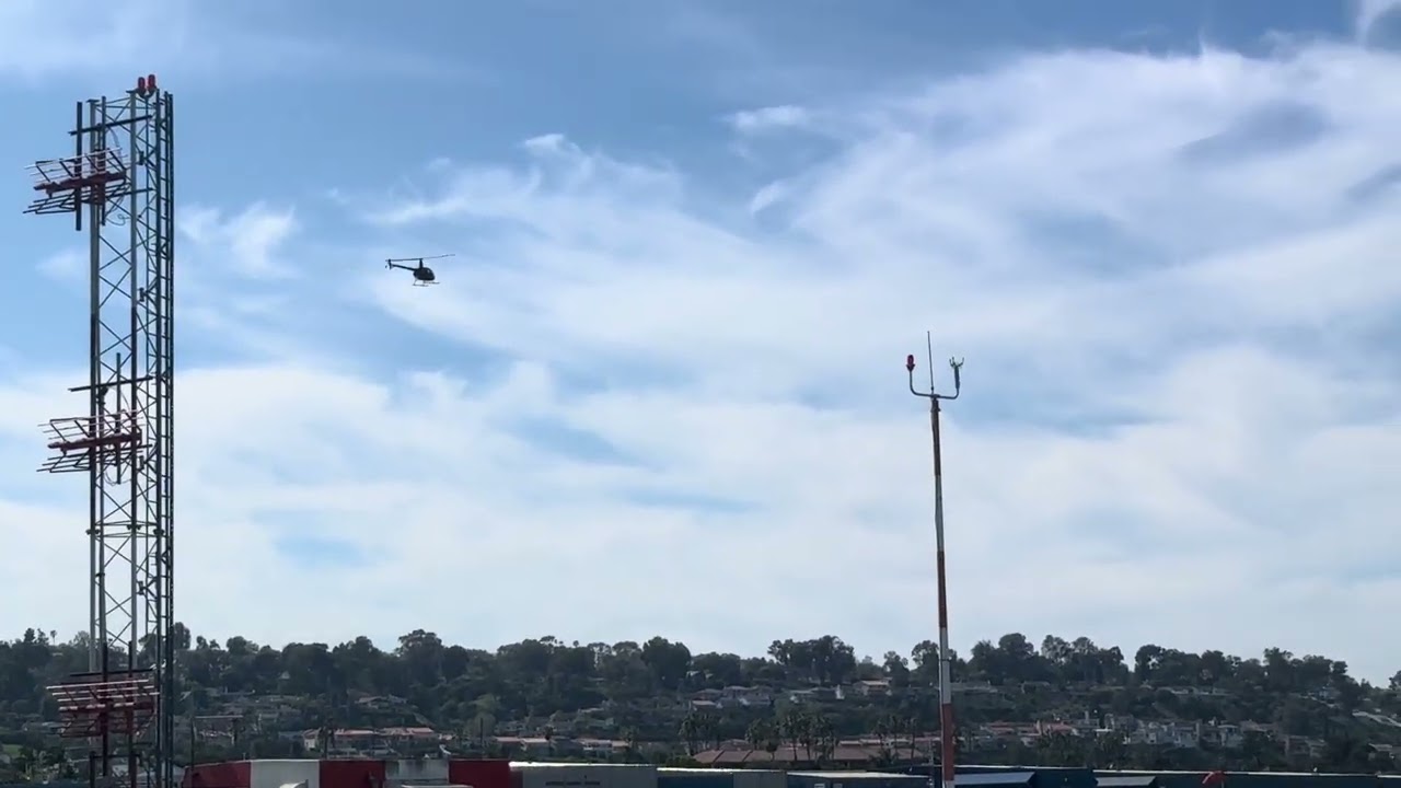 Robinson R22 Helicopter taking off from Torrance Airport