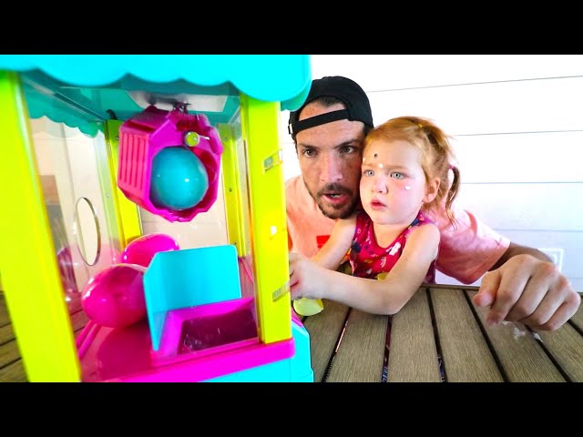 TOY CLAW MACHINE!! Adley and Dad Master our NEW Family Game!  (mini pets inside) class=