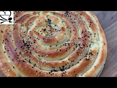 فيديو: كيفية عمل فطيرة جبن على شكل حلزون