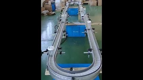 Round circle plastic bottles conveying flexible chain conveyor testing in Maxsen factory 1