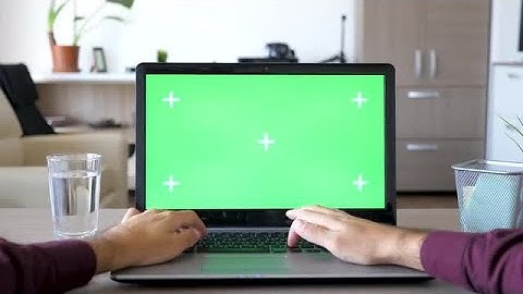 Typing On Laptop With Green Screen Stock Video