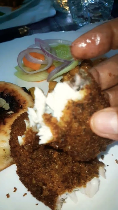 soft juice outside crispy fish fry with kasundi.