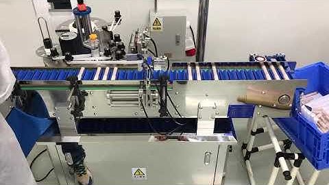 Lip gloss tube bottom labeling machine