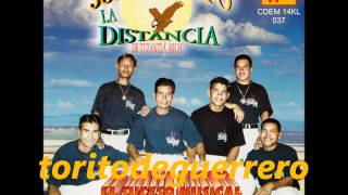 Video thumbnail of "Ojos Castaños-LA DISTANCIA DE TUZANTLA MICH,"