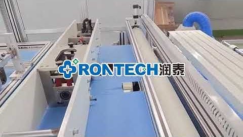 Surgical drape with fenestration and adhesive tape folding machine