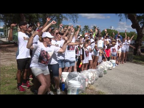 Beach cleanup honors Surfside victims who loved the ocean