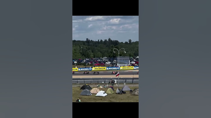 Marc Marquez taking the lead from Pecco Bagnaia at Brno 2025