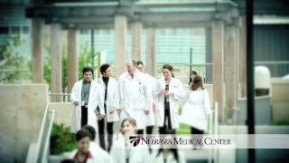 Physicians in White Coats Walking up Steps - Did You Know? - The Nebraska Medical Center Campaign