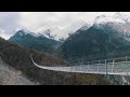 Longest pedestrian suspension bridge soars over Swiss Alps valley