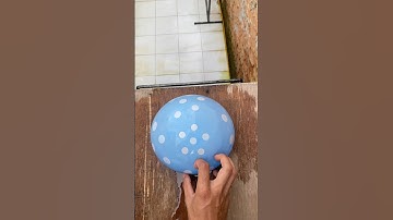 Experiment: Will a polka dot water balloon explode if dropped from a height?