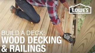 Watch to learn how to install wood decking and railings. Full project details on Lowes.com: http://low.es/2kWJx2A Subscribe to 