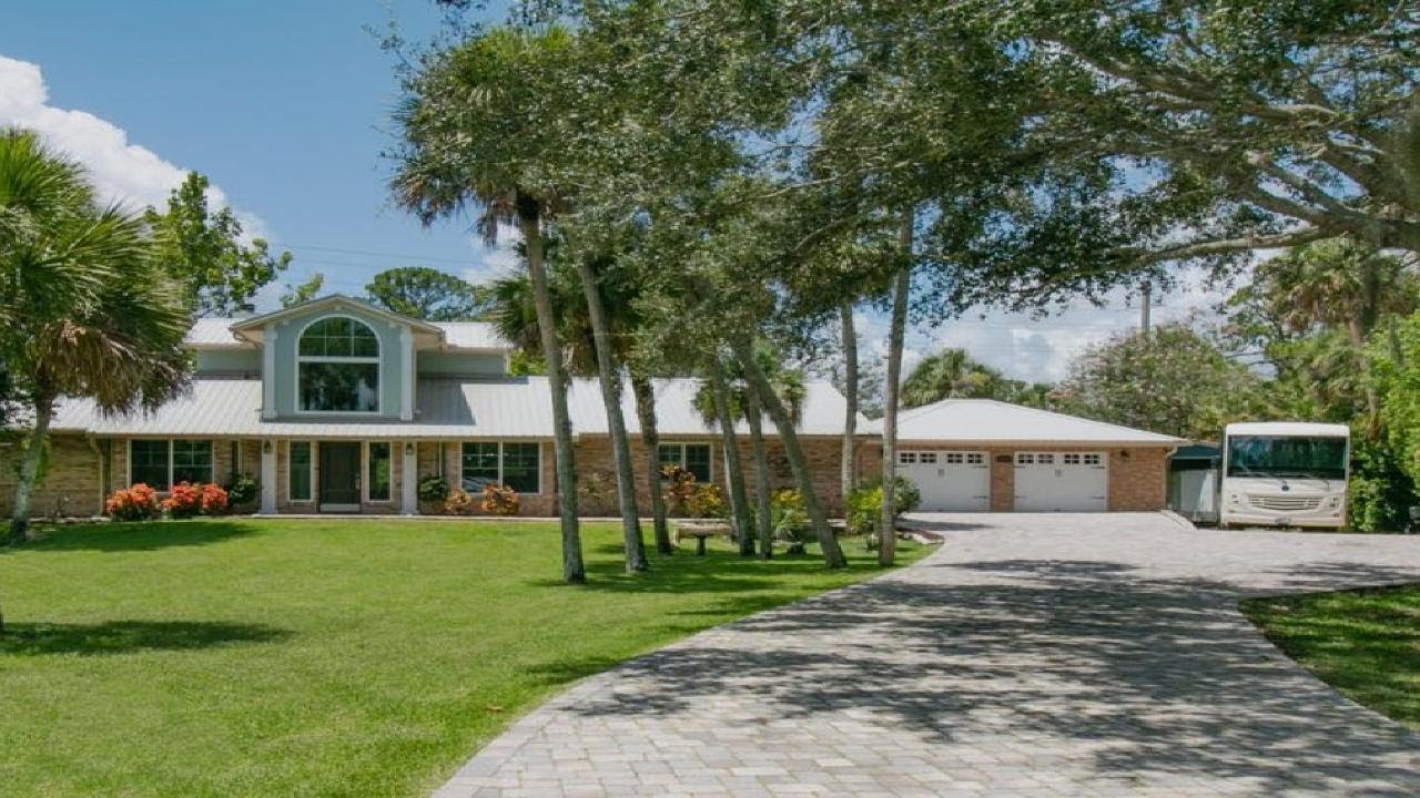 1831 Live Oak Dr S, Rockledge, FL Presented by Fleckinger Team - Larry & Karen.