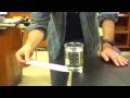 table cloth trick with beaker of water