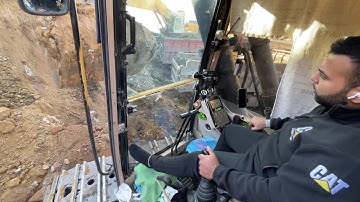 Inside the Cabin Of A Cat 375 Excavator At A Massive Mining Site – Precision In Action