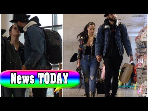 Demi rose pictured kissing mystery man at the airport in madrid | News TODAY