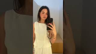 Jules LeBlanc tries on Reformation clothes