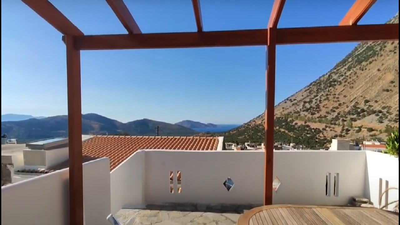 Stone Village house for sale, with garden and sea views. Kavousi, Crete