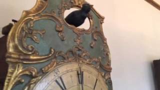 A Pair of Rare Musical 18th Century Black Forest Clocks