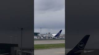 Lufthansa A380 Disappears Behind Building