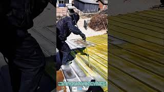 Cleaning Metal Roof Surface using High-Pressure Washer for Rust and Dirt Removal