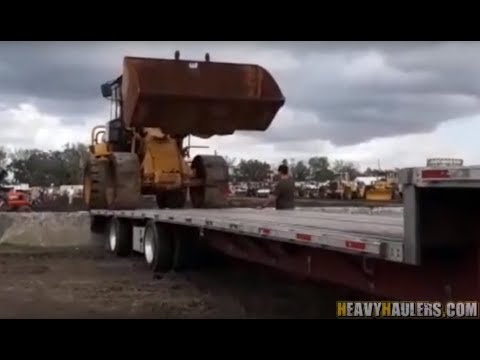 How to Load a Wheel Loader | With Heavy Haulers - video from Heavy Haulers