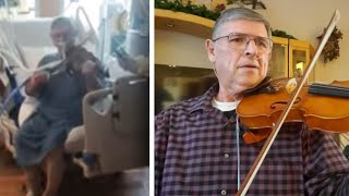 Retired Teacher Who Played Violin While Intubated Is Home Safe