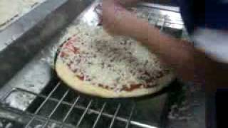 CJ large pizza in under 30 seconds dominos