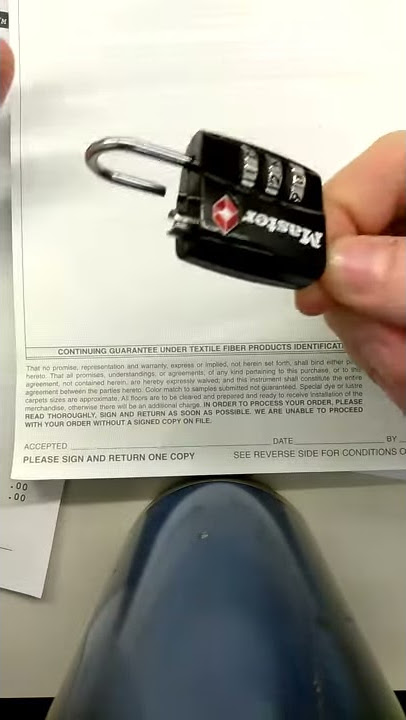 TSA 002 lock opened with paperclip