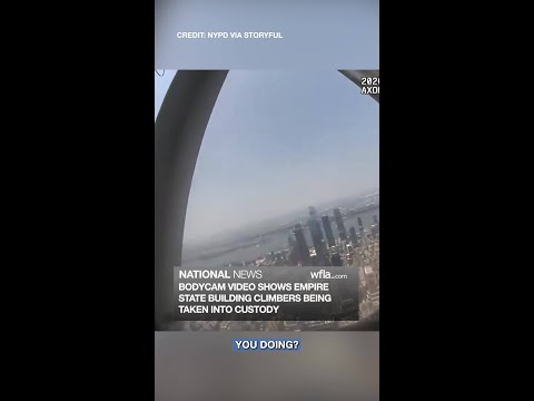 Video Body camera video shows empire state building climbers being taken into custody