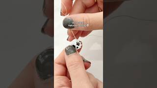 Making skeleton earrings💀🦴 #halloween #skull #diyearrings #tutorial #jewelrymaking #skeleton #diy