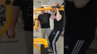 Powertech Leg Squats working with a 73 year old Parkinson's Client