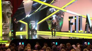 Tom Hardy presenting best actress award at BAFTA 2014