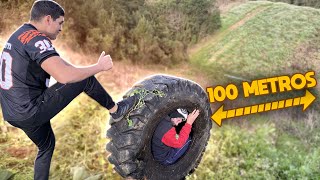 JOGUEI MEU AMIGO MORRO A BAIXO DENTRO DE UM PENEU