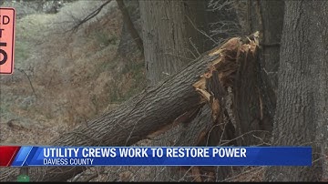 Utility Crews Work to Restore Power