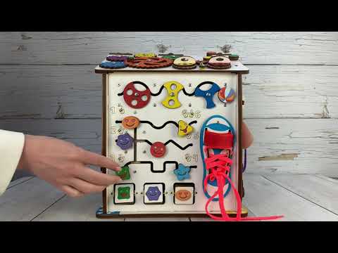 Бизиборд домик Смайлики на аттракционе от Эвотойс. Развивающий домик для ребенка