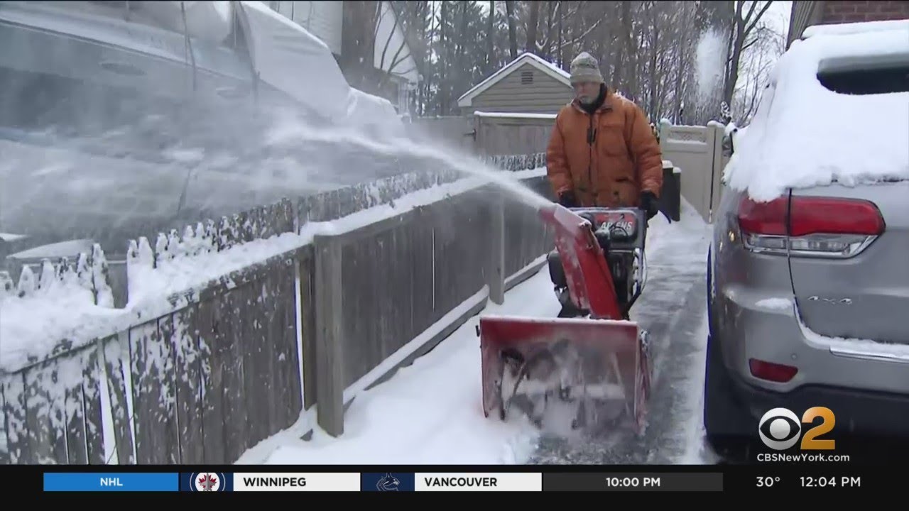 Winter Storm Cleanup Continues On Long Island As Snow Showers Linger