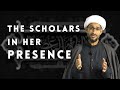 The scholars in her presence