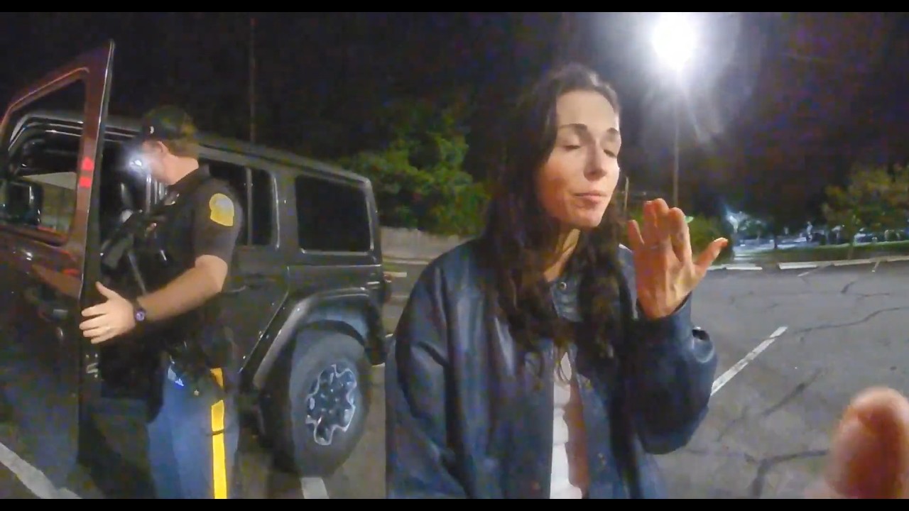 Drunk Woman Argues With Cop After Fight With Husband