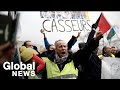 Yellow vest protesters, students march through Paris streets under close watch of police