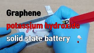 graphene and potassium hydroxide solid state battery